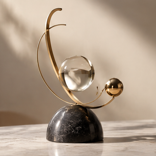 Crystal sphere crescent balance sculpture — clean product shot